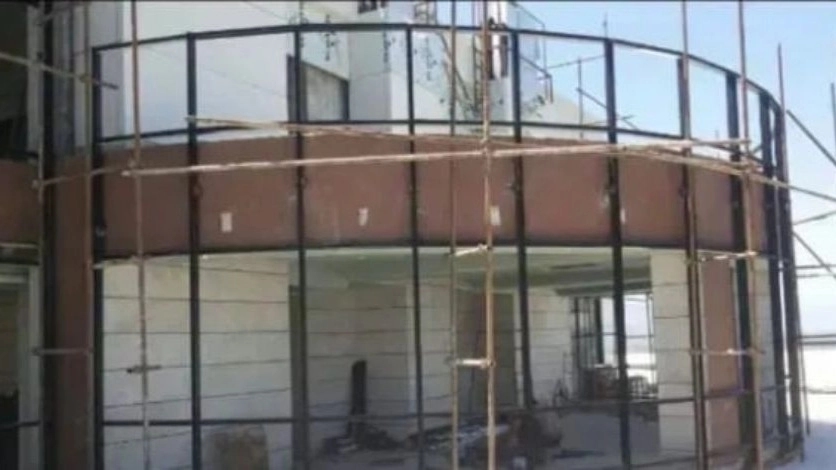 Professional curtain wall facade with door area in Qu and Namak Motel, Abroud, Mazandaran, a short summary